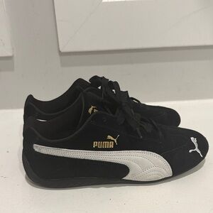 Puma Black Suede Shoes with White Formstrip and Gold Logo